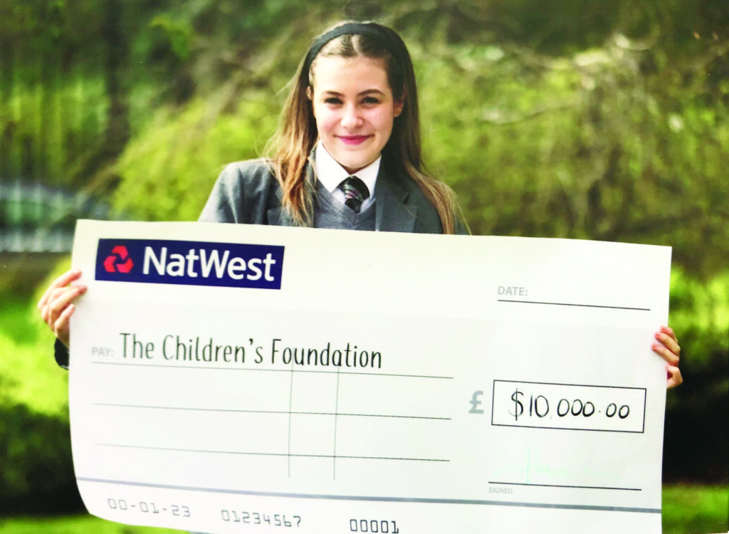 A proud moment for Kara-Amber, presenting a cheque for $10,000 donation to The Children’s Foundation.